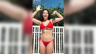 Big natural 18 year old tits bouncing in a bikini