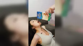 Busty woman drinking nut milk #3