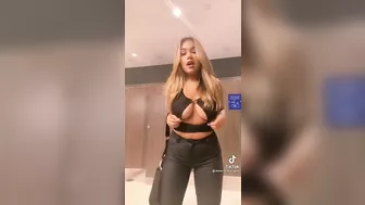 Ikingm tits spilling out of her top #4