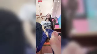 Girl shows sweaty work feet (close-up) on TikTok Live