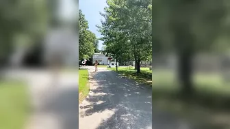 Girl in bikini roller skating.