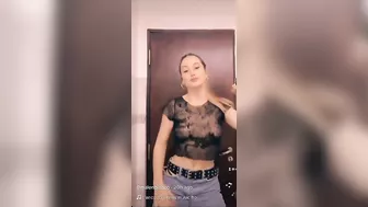 Not sure what the design on her shirt is. Keep staring until you can figure it out. #3
