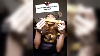 Peeling a banana with her feet #2